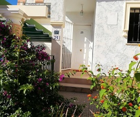 House with 3 bedrooms in La Nucia with wonderful sea view shared pool enclosed garden 5 km from the beach